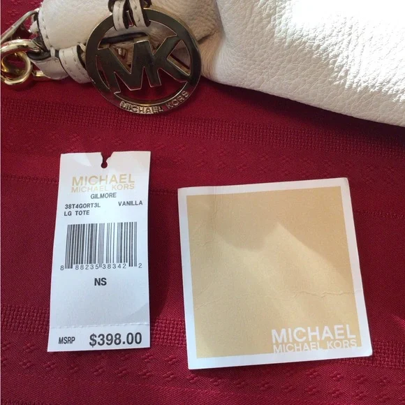 Michael Kors off vanilla colored leather purse - Picture 9 of 10